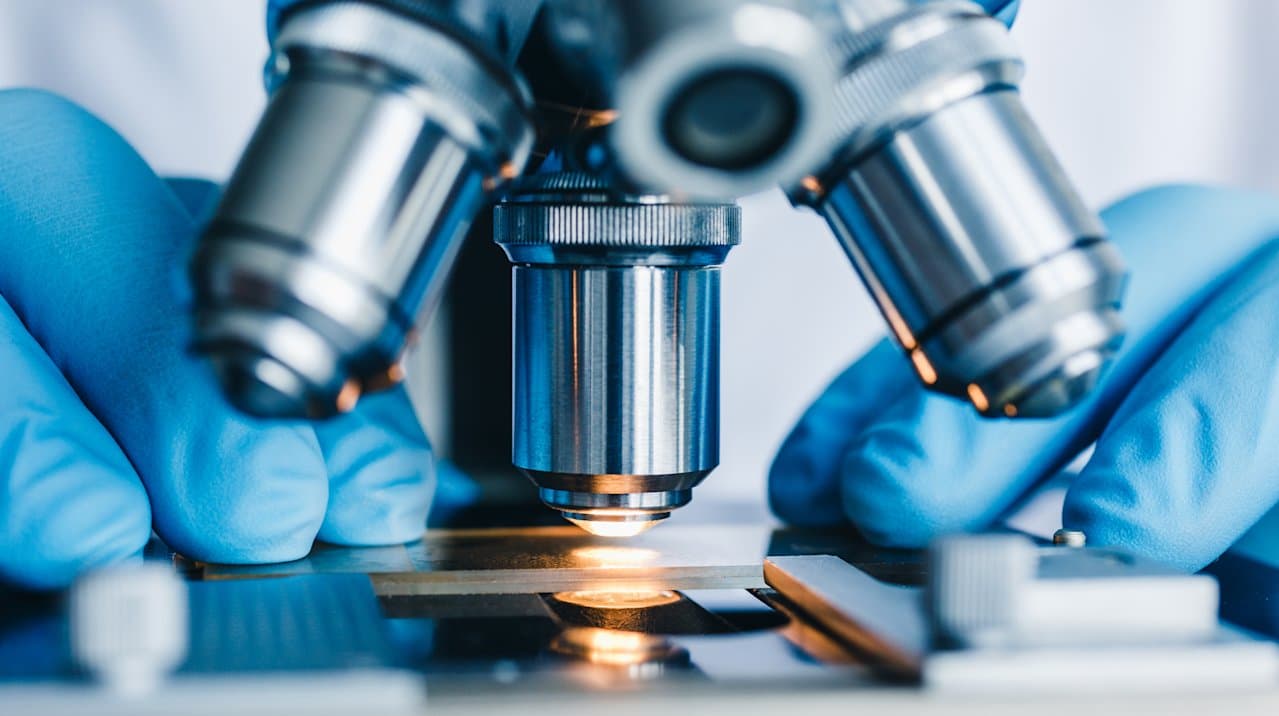 Pharmaceutical technology team working in a regulated environment